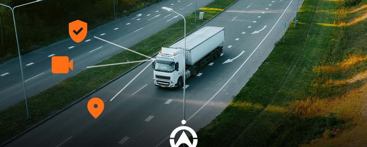 Aerial view of a white truck on a road, with icons representing security, video, and location tracking above it.